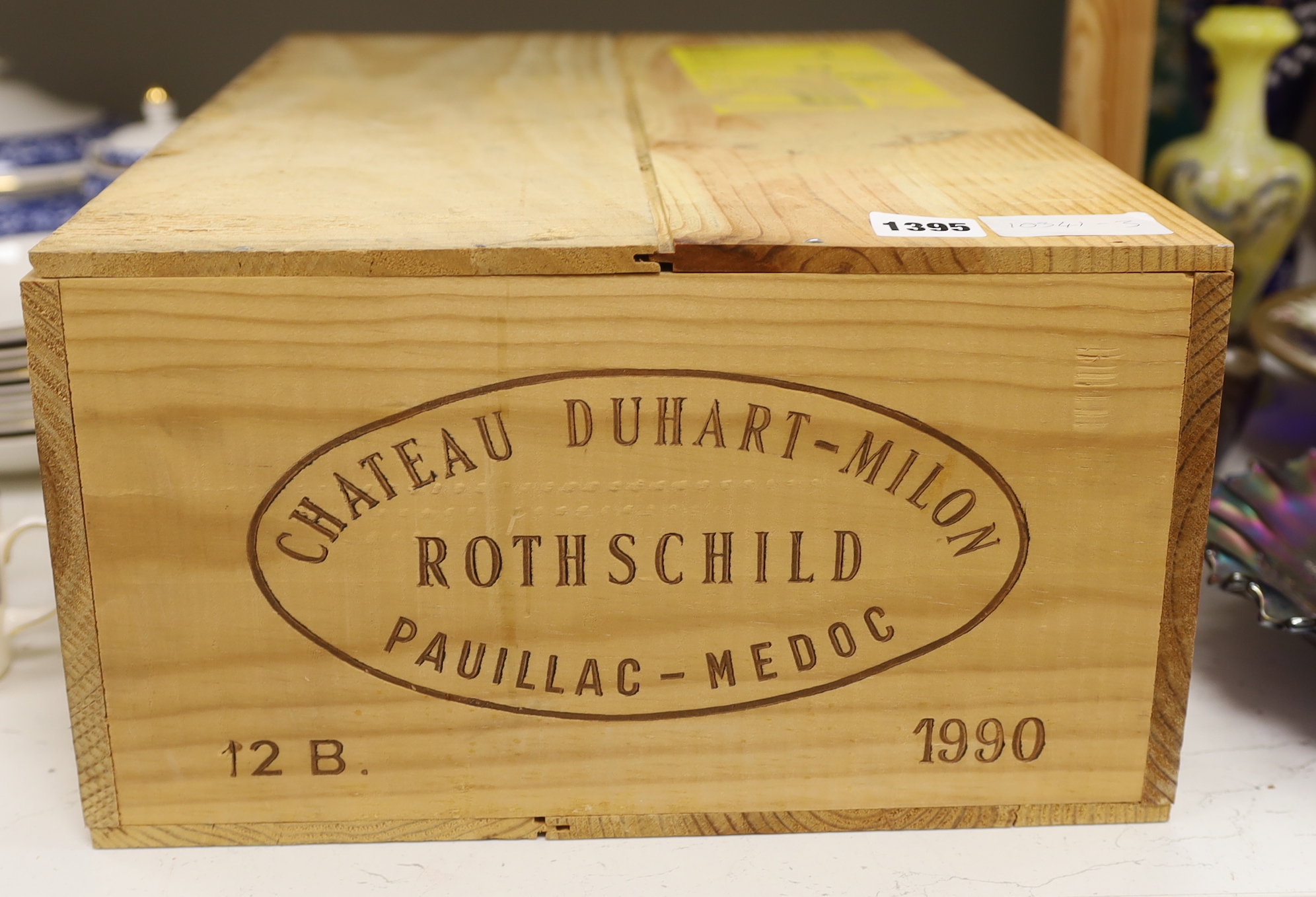 Twelve bottles of Chateau Duhart Milon, 1990, in OWC, purchased from The Wine Society.